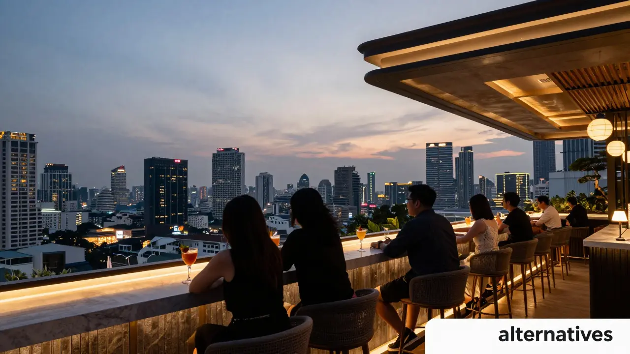 Elegant rooftop bar view with Bangkok skyline at dusk